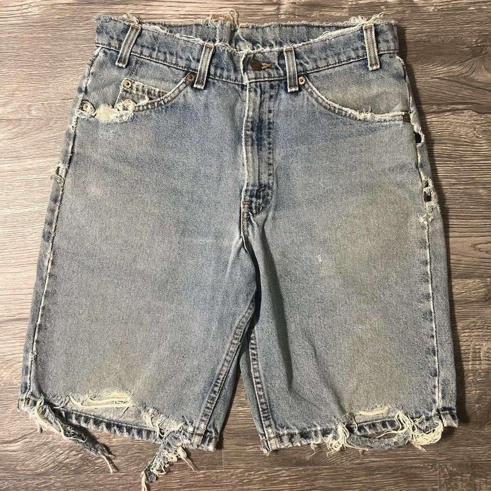 Vintage Levi's 550 Heavily Distressed Light Wash Blue Jean Shorts Size 32x10 USA